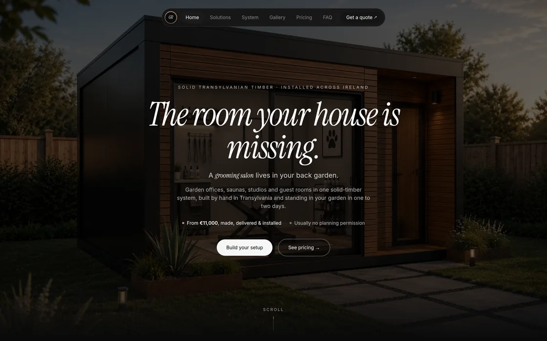 The Garden Rooms homepage, a lit timber garden office at dusk